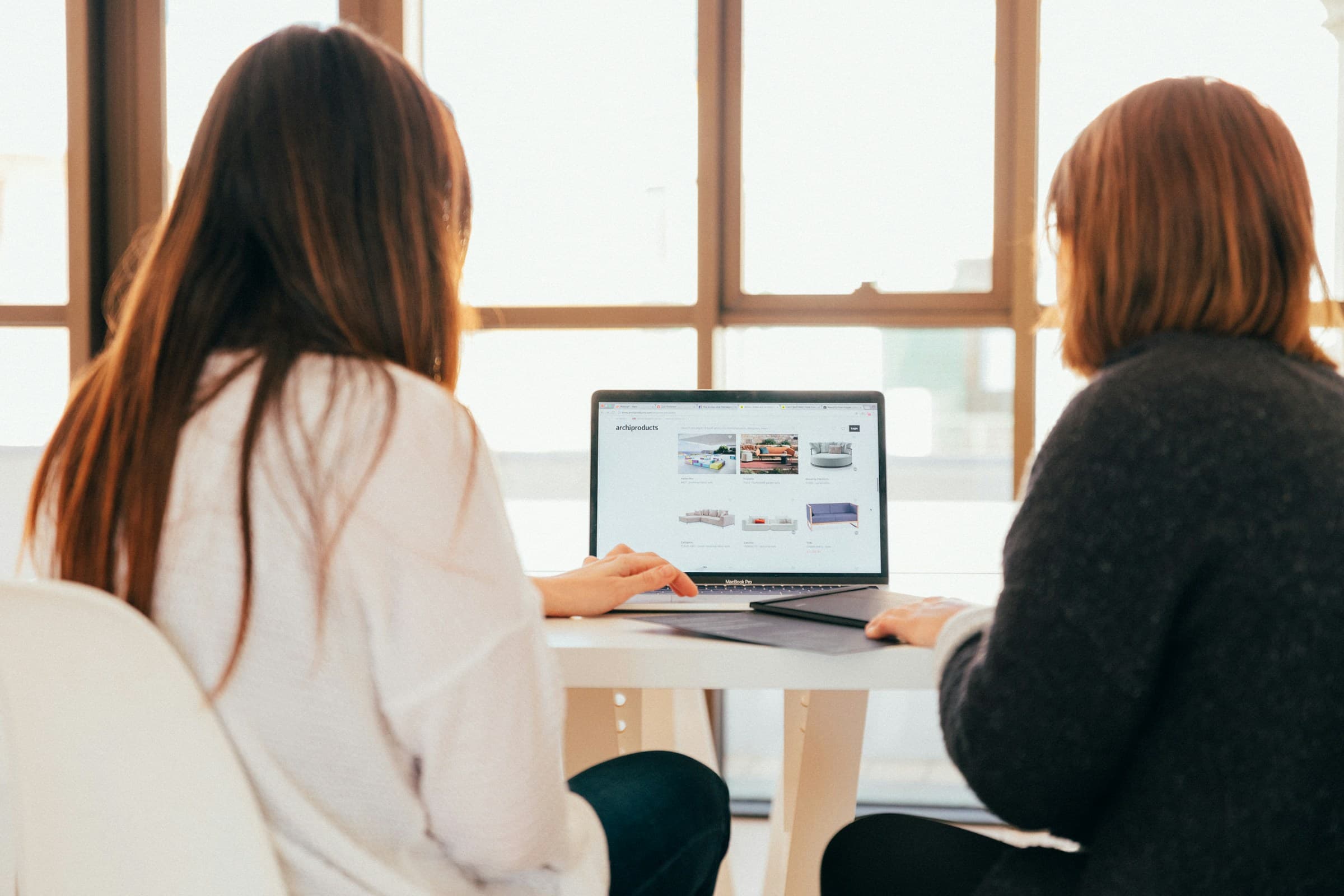 Two people in a meeting